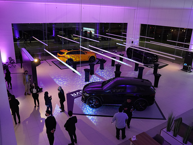 Overhead view of Jaguar showroom, with 3 units of Jaguar F-PACE SVR